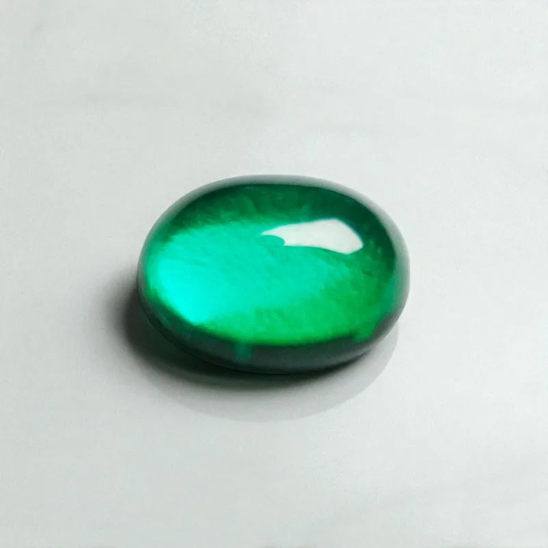 Lab Grown Zambian Emeralds Oval Smooth Surface Jewelry Production Main with Cracks Inclusions Inside Shape AGL Certificate